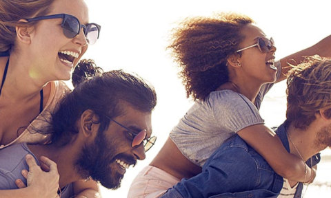 Two couples with sunglasses on