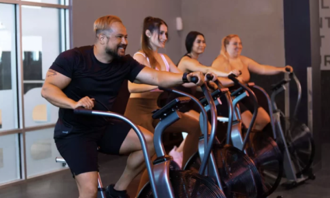 4 people on stationary bikes