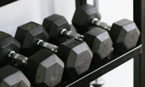 rack of assorted sized dumbells