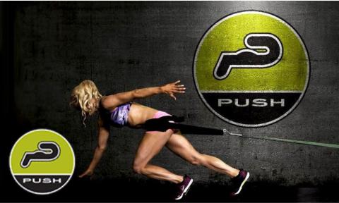 woman running with a tow rope with Push Gym logo in bottom left corner