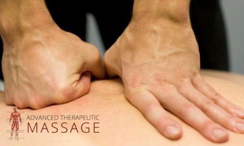 Fist and open hand laid on a person's back for a massage, Advanced Therapeutic Massage logo in bottom left corner