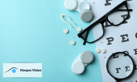 layout of glasses, contact case with hoopes vision logo in bottom left corner