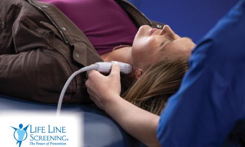a woman getting an ultrasound on her neck