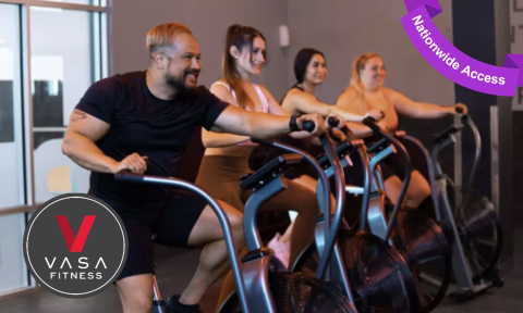 4 people on stationary bikes with Vasa fitness logo on bottom left corner, purple banner top right corner reading nationwide access
