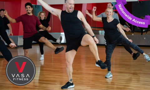 group fitness class with enthusiastic male instructor with Vasa fitness logo on bottom left corner, purple banner right corner reading nationwide access