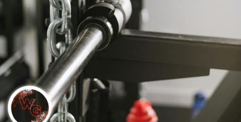 lateral pull machine with Warrior Gym logo on bottom left corner
