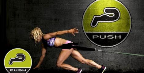 woman running with a tow rope with Push Gym logo in bottom left corner