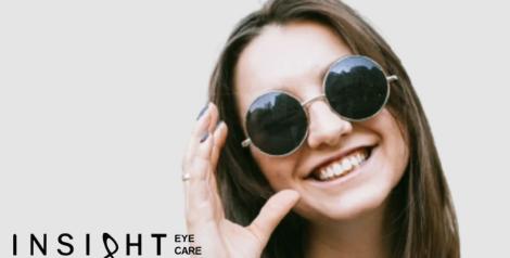 Women with round sunglasses on with insight eye care logo in lower left corner