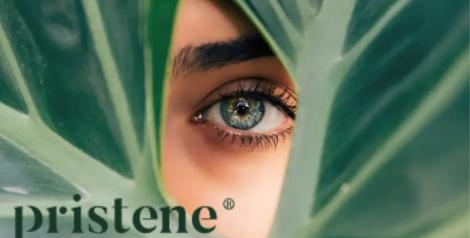 woman's eye looking between leaves with pristene logo on bottom left corner