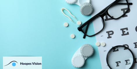 layout of glasses, contact case with hoopes vision logo in bottom left corner
