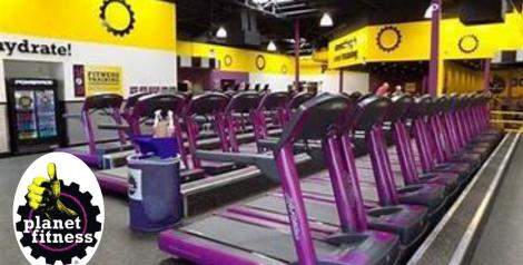 treadmills in a yellow and purple gym, Planet Fitness Logo in bottom left corner