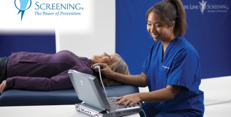 Woman getting an ultrasound of her neck 