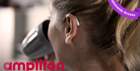 back of a woman's head, she is drinking out of a coffee cup and has a hearing aid on, purple banner top right corner reading nationwide access
